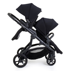 iCandy Orange 4 Twin Bundle - Black Edition - shown as the pushchair with two seat units, one parent-facing and one forward-facing 