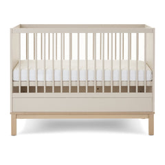 Obaby Astrid Mini Cot Bed - 120x60cm Satin - showing the cot with the mattress base at its middle level