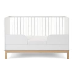 Obaby Astrid Cot Bed (140x70cm) - White - side view, shown as the junior bed with its safety rails