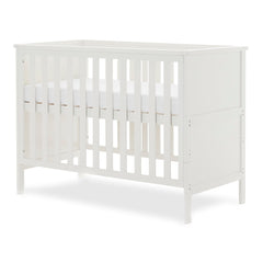 Obaby Evie MINI Cot Bed - White - showing the mini cot with its mattress base at the lowest level (mattress not included)