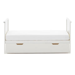 Obaby Evie MINI Cot Bed with Under Drawer - 120x60cm White - showing the junior bed with the under drawer