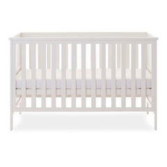 Obaby Evie Cot Bed - White - showing the cot with its mattress base at the middle level