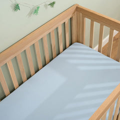 Clair De Lune Fitted Sheets COT 120x60cm - Blue - shown fitted to a cot mattress