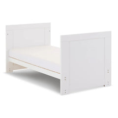 Obaby Nika MINI Cot Bed - White Wash side view, showing the junior/toddler bed