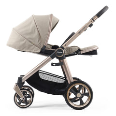 BabyStyle Oyster 3 LUXURY Bundle with Maxi-Cosi Pebble 360 Pro (Creme Brulee) - side view, showing the pushchair with the seat fully reclined and leg rest raised