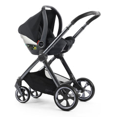 Maxi-Cosi CabrioFix i-Size Infant Car Seat - Essential Black - attached to the CabrioFix i-Size ISOFIX base