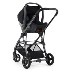 BabyStyle Oyster Capsule i-Size Infant Car Seat - Carbonite - showing the car seat fixed to the Gravity`s chassis