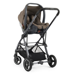 BabyStyle Oyster Capsule i-Size Infant Car Seat - Mink - showing the car seat fixed to the Gravity`s chassis