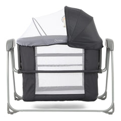 BabyStyle Oyster Swinging Crib (Carbonite) - side view, showing the crib with its base lowered