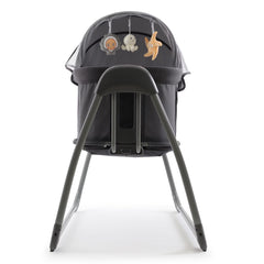 BabyStyle Oyster Swinging Crib (Carbonite) - end view, showing the mobile toys hanging from the canopy and its supporting legs