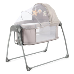 BabyStyle Oyster Swinging Crib (Stone) - showing the crib with its canopy and hanging toys